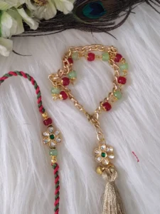 Stylish Kundan pair with bracelet lumba